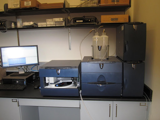 Large white instrument on countertop.